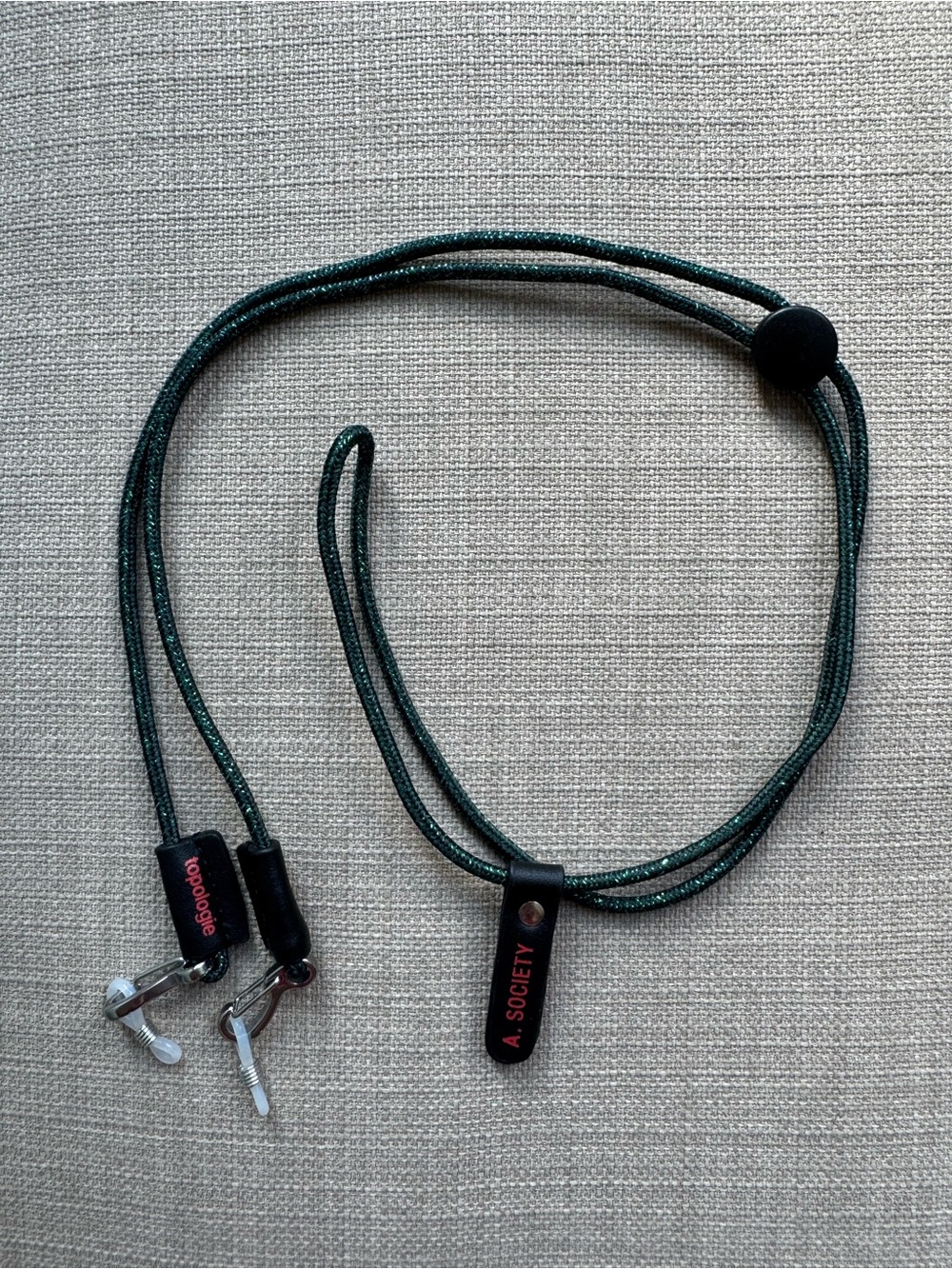 Topologie eyeglass strap - green